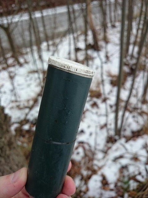 En grön plastcylinder